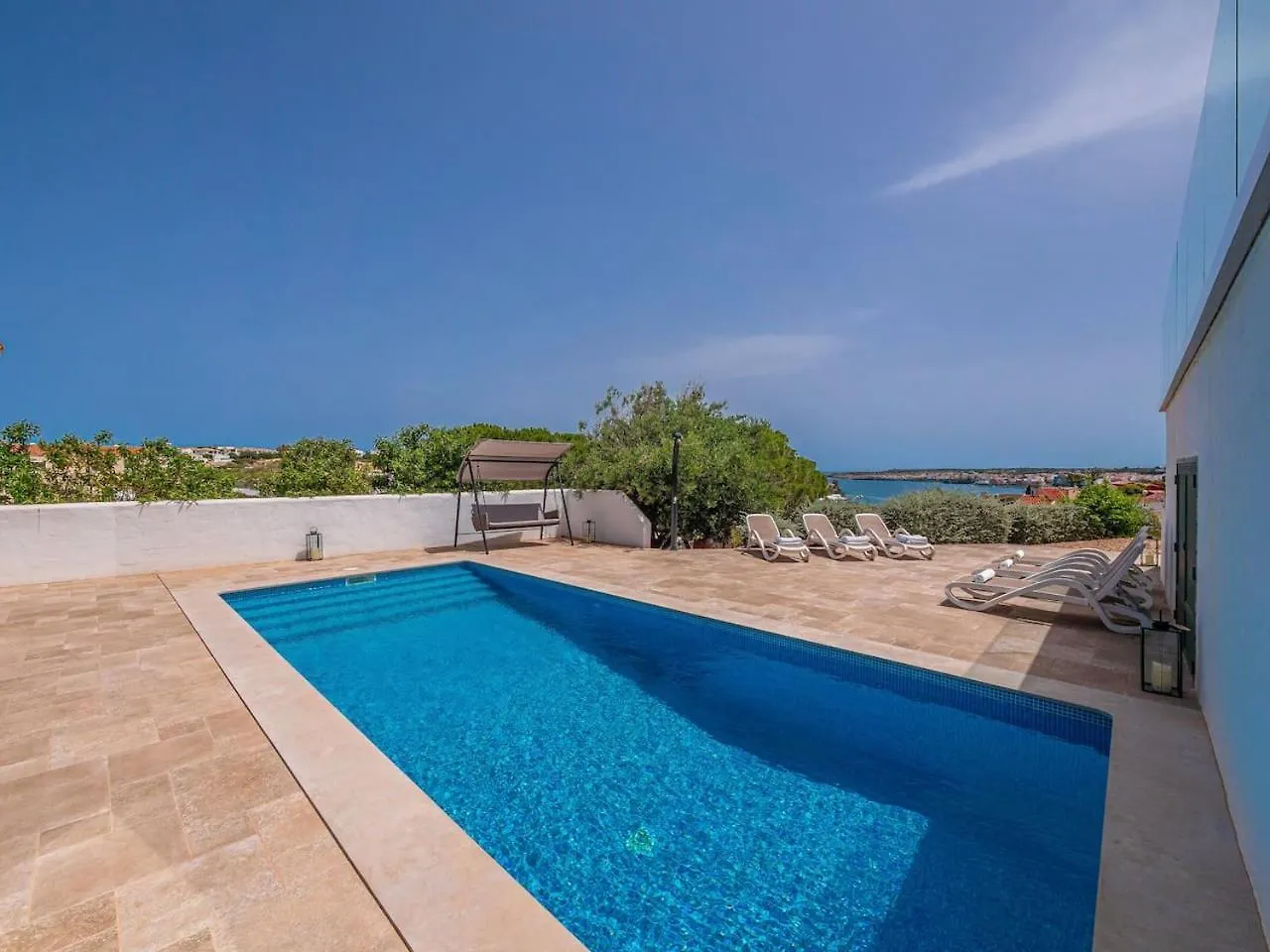 Villaser Cala Llonga  Cala Llonga (Menorca)